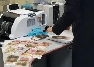 現金微波爐消毒被燒焦，華視錢幣消毒器保安全